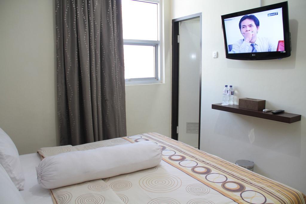 Vindhika Hotel Makassar Værelse billede