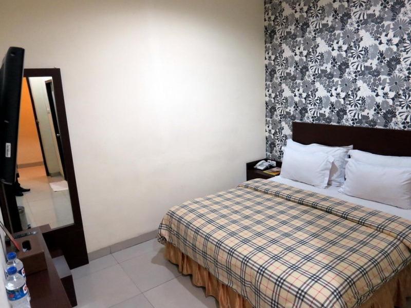 Vindhika Hotel Makassar Værelse billede